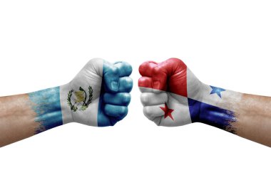 Two hands punch to each others on white background. Country flags painted fists, conflict crisis concept between guatemala and panama