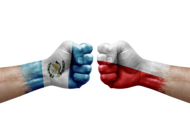 Two hands punch to each others on white background. Country flags painted fists, conflict crisis concept between guatemala and poland