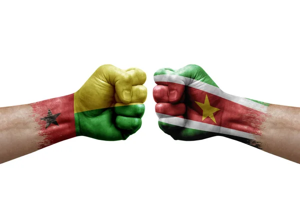 Two Hands Punch Each Others White Background Country Flags Painted — Stock Fotó