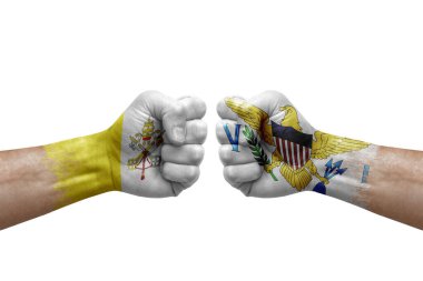 Two hands punch to each others on white background. Country flags painted fists, conflict crisis concept between holy see and virgin islands