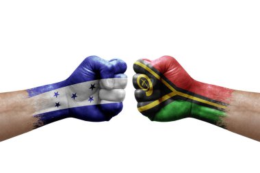 Two hands punch to each others on white background. Country flags painted fists, conflict crisis concept between honduras and vanuatu