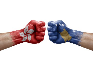 Two hands punch to each others on white background. Country flags painted fists, conflict crisis concept between hong kong and kosovo