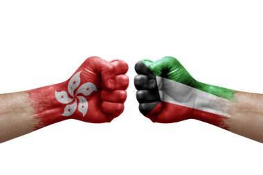 Two hands punch to each others on white background. Country flags painted fists, conflict crisis concept between hong kong and kuwait