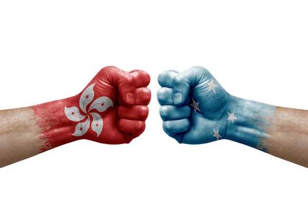 Two Hands Punch Each Others White Background Country Flags Painted — Stockfoto