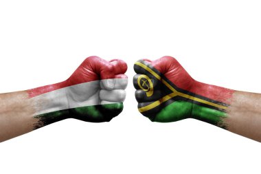 Two hands punch to each others on white background. Country flags painted fists, conflict crisis concept between hungary and vanuatu