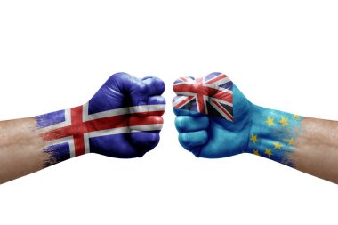 Two hands punch to each others on white background. Country flags painted fists, conflict crisis concept between iceland and tuvalu
