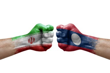 Two hands punch to each others on white background. Country flags painted fists, conflict crisis concept between iran and laos
