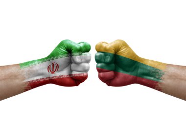 Two hands punch to each others on white background. Country flags painted fists, conflict crisis concept between iran and lithuania