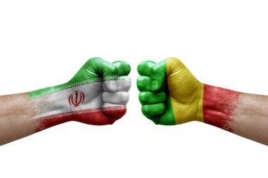 Two hands punch to each others on white background. Country flags painted fists, conflict crisis concept between iran and mali