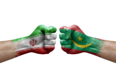 Two hands punch to each others on white background. Country flags painted fists, conflict crisis concept between iran and mauritania