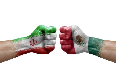 Two hands punch to each others on white background. Country flags painted fists, conflict crisis concept between iran and mexico