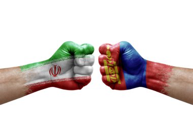 Two hands punch to each others on white background. Country flags painted fists, conflict crisis concept between iran and mongolia