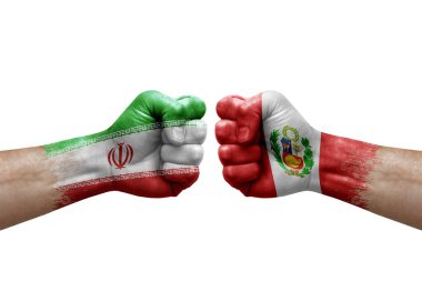 Two hands punch to each others on white background. Country flags painted fists, conflict crisis concept between iran and peru