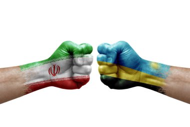 Two hands punch to each others on white background. Country flags painted fists, conflict crisis concept between iran and rwanda