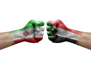 Two hands punch to each others on white background. Country flags painted fists, conflict crisis concept between iran and sudan
