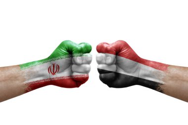 Two hands punch to each others on white background. Country flags painted fists, conflict crisis concept between iran and yemen