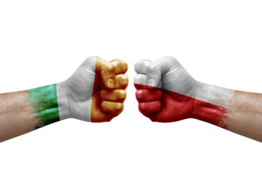 Two hands punch to each others on white background. Country flags painted fists, conflict crisis concept between ireland and poland