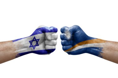 Two hands punch to each others on white background. Country flags painted fists, conflict crisis concept between israel and marshall islands