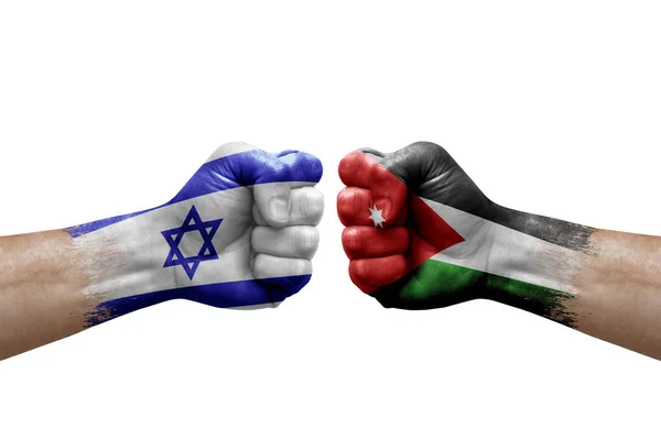 Two hands punch to each others on white background. Country flags painted fists, conflict crisis concept between israel and jordan