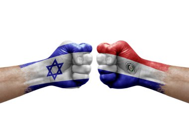 Two hands punch to each others on white background. Country flags painted fists, conflict crisis concept between israel and paraguay