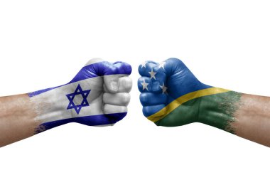 Two hands punch to each others on white background. Country flags painted fists, conflict crisis concept between israel and solomon islands