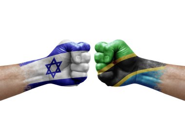 Two hands punch to each others on white background. Country flags painted fists, conflict crisis concept between israel and tanzania