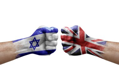 Two hands punch to each others on white background. Country flags painted fists, conflict crisis concept between israel and united kingdom