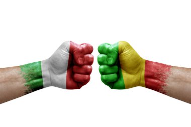 Two hands punch to each others on white background. Country flags painted fists, conflict crisis concept between italy and mali