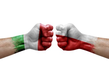 Two hands punch to each others on white background. Country flags painted fists, conflict crisis concept between italy and poland