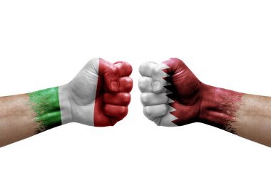 Two hands punch to each others on white background. Country flags painted fists, conflict crisis concept between italy and qatar
