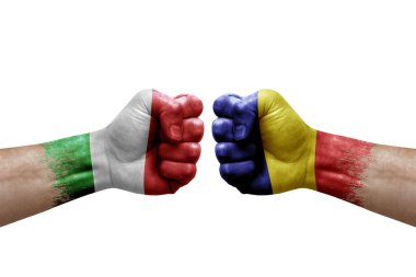 Two hands punch to each others on white background. Country flags painted fists, conflict crisis concept between italy and romania