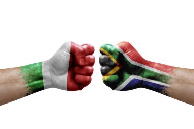 Two hands punch to each others on white background. Country flags painted fists, conflict crisis concept between italy and south africa