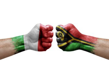 Two hands punch to each others on white background. Country flags painted fists, conflict crisis concept between italy and vanuatu