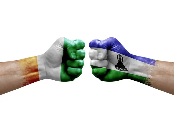 Two Hands Punch Each Others White Background Country Flags Painted — Stockfoto