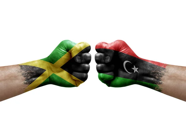 Two Hands Punch Each Others White Background Country Flags Painted – stockfoto