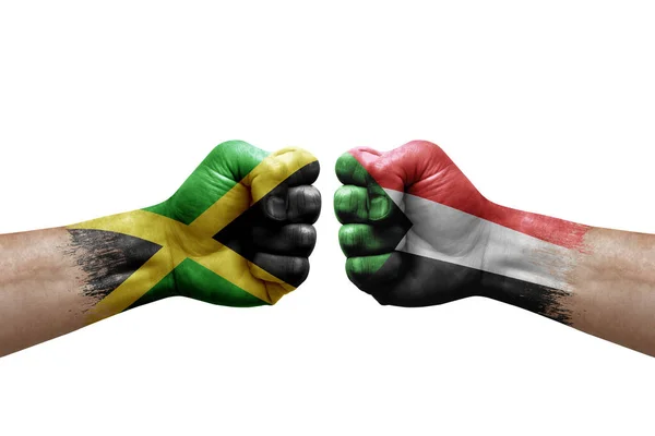 Two Hands Punch Each Others White Background Country Flags Painted – stockfoto