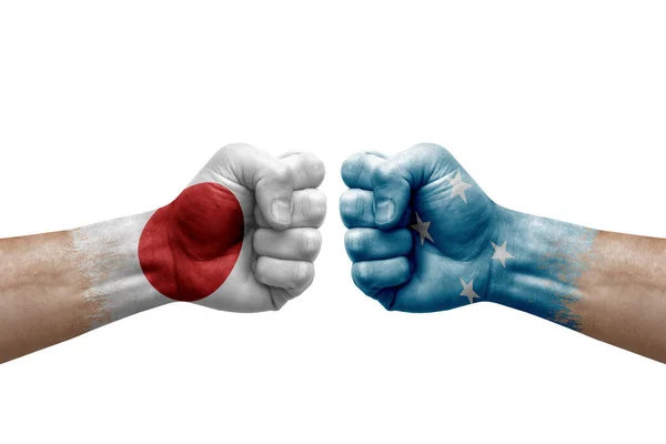 Two Hands Punch Each Others White Background Country Flags Painted — Stock Photo, Image