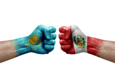 Two hands punch to each others on white background. Country flags painted fists, conflict crisis concept between kazakhstan and peru