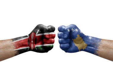 Two hands punch to each others on white background. Country flags painted fists, conflict crisis concept between kenya and kosovo