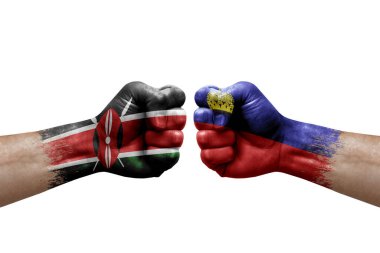 Two hands punch to each others on white background. Country flags painted fists, conflict crisis concept between kenya and liechtenstein