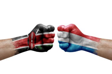 Two hands punch to each others on white background. Country flags painted fists, conflict crisis concept between kenya and luxembourg