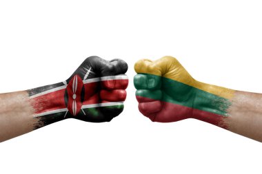 Two hands punch to each others on white background. Country flags painted fists, conflict crisis concept between kenya and lithuania