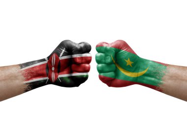 Two hands punch to each others on white background. Country flags painted fists, conflict crisis concept between kenya and mauritania