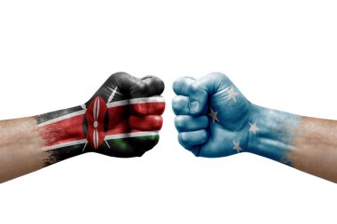 Two hands punch to each others on white background. Country flags painted fists, conflict crisis concept between kenya and micronesia