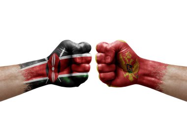 Two hands punch to each others on white background. Country flags painted fists, conflict crisis concept between kenya and montenegro