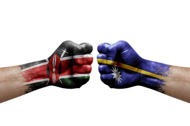 Two hands punch to each others on white background. Country flags painted fists, conflict crisis concept between kenya and nauru