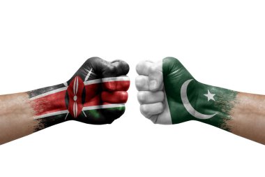 Two hands punch to each others on white background. Country flags painted fists, conflict crisis concept between kenya and pakistan