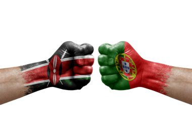 Two hands punch to each others on white background. Country flags painted fists, conflict crisis concept between kenya and portugal