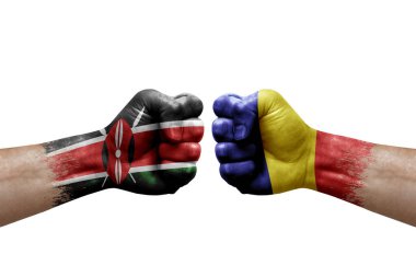 Two hands punch to each others on white background. Country flags painted fists, conflict crisis concept between kenya and romania