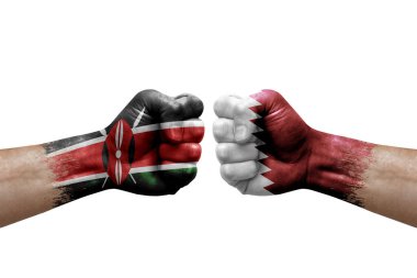 Two hands punch to each others on white background. Country flags painted fists, conflict crisis concept between kenya and qatar